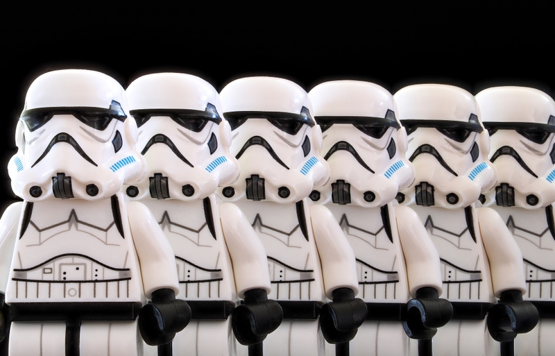 A row of stormtrooper lego figures.